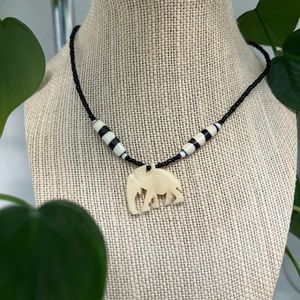 Beautiful carved elephant necklace